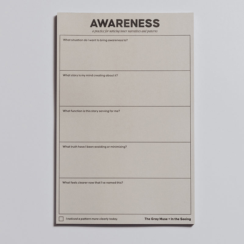 Single beige Awareness notepad with bold title at top and blank sections wrapped with a band
