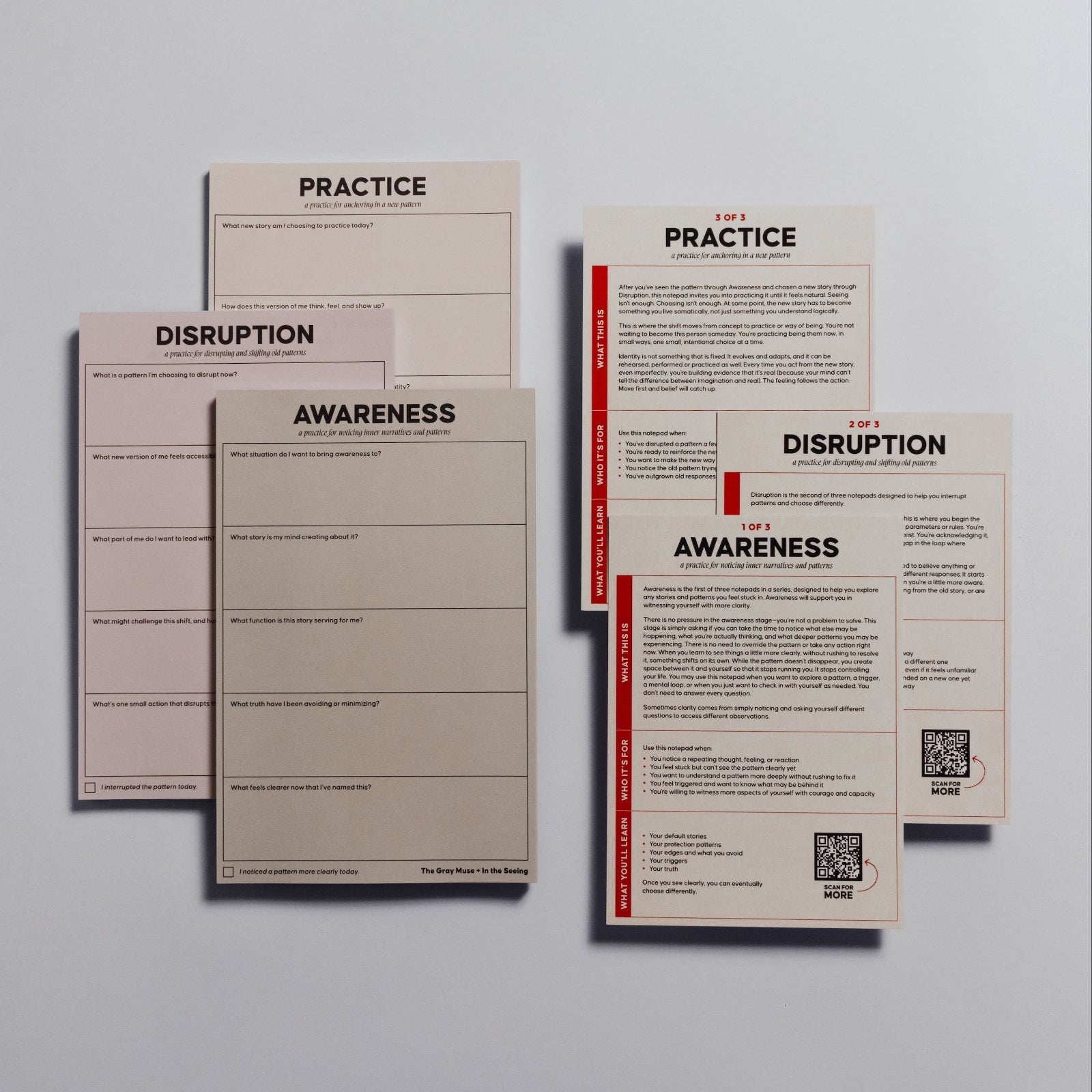 Awareness Disruption Practice Notepad Set featuring three half letter size notebooks in soft beige and pink tones arranged together.