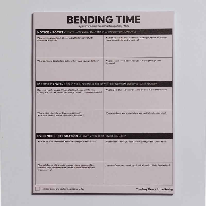 Bending Time Notepad in soft pink with bold header and grid prompts, a single notepad laid flat with a decorative wrap.