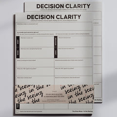 Two overlapping Decision Clarity Notepads with a bold DECISION CLARITY header and a grid of prompts