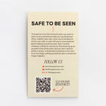 Beige card for the Safe to Be Seen spinner featuring bold heading, descriptive text, a QR code, and social resources