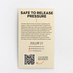 Beige card titled Safe to Release Pressure with instructions on how to use the spinner