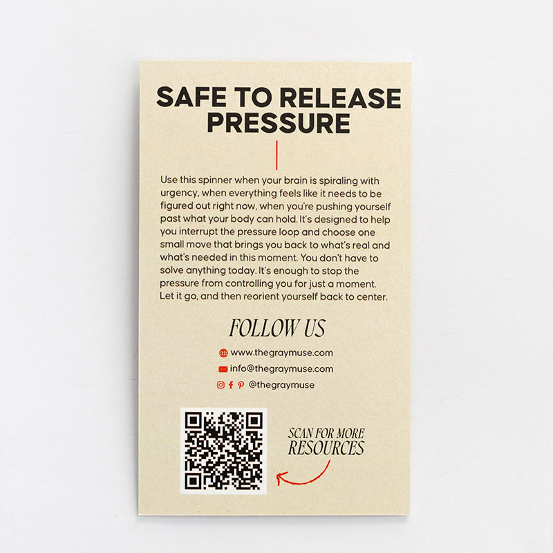 Beige card titled Safe to Release Pressure with instructions on how to use the spinner