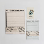 Staying with Yourself bundle on a white wall featuring Relational Standards poster, two notepads, and a keychain.