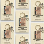 Grid of beige packaging cards for The Expansion Edge interactive enamel keychain, shown from multiple angles.
