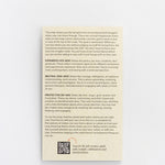 Back panel of The Frequency Field Slider Interactive Enamel Keychain with explanatory text about expanding emotional states and frequencies.